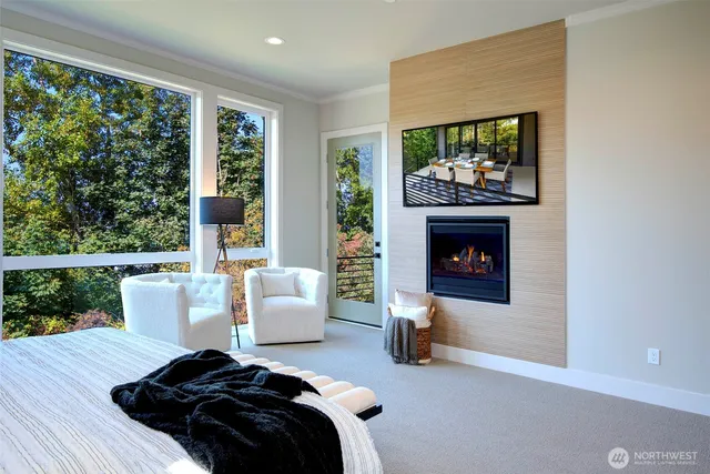 a bedroom with a bed and a fireplace