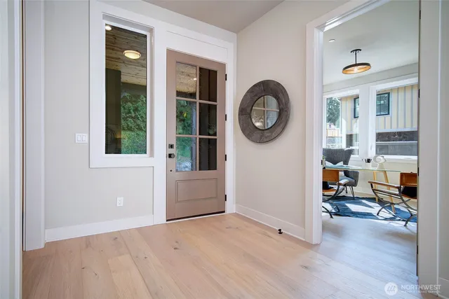 a view of a livingroom with furniture and window