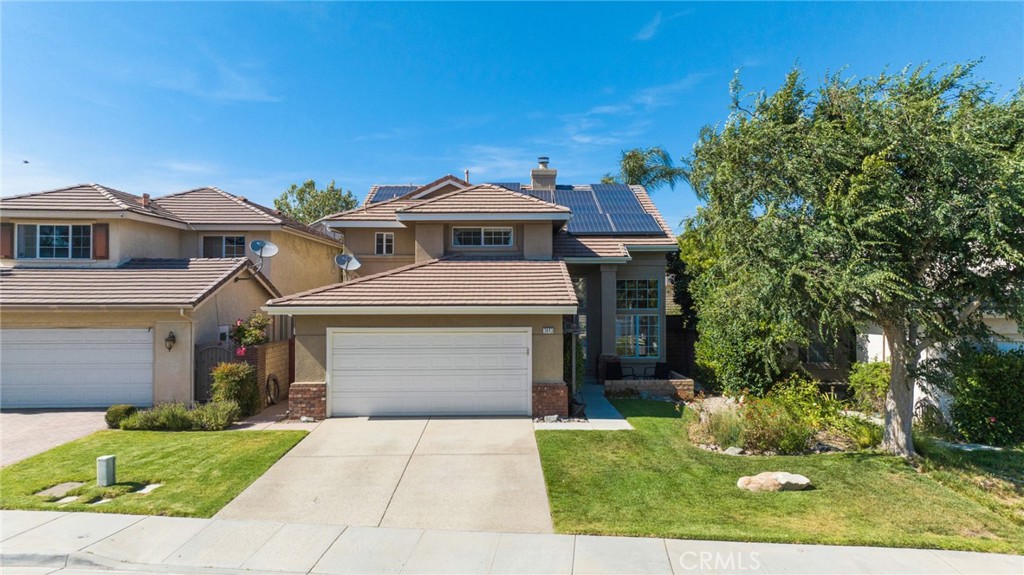 3843 San Gabriel Street Simi Valley, CA 93063 - Photo 50 of 52 a front view of a house with a yard