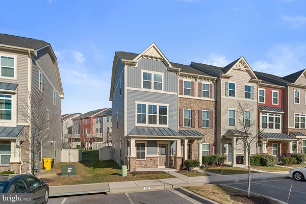 a front view of a residential apartment building with street view