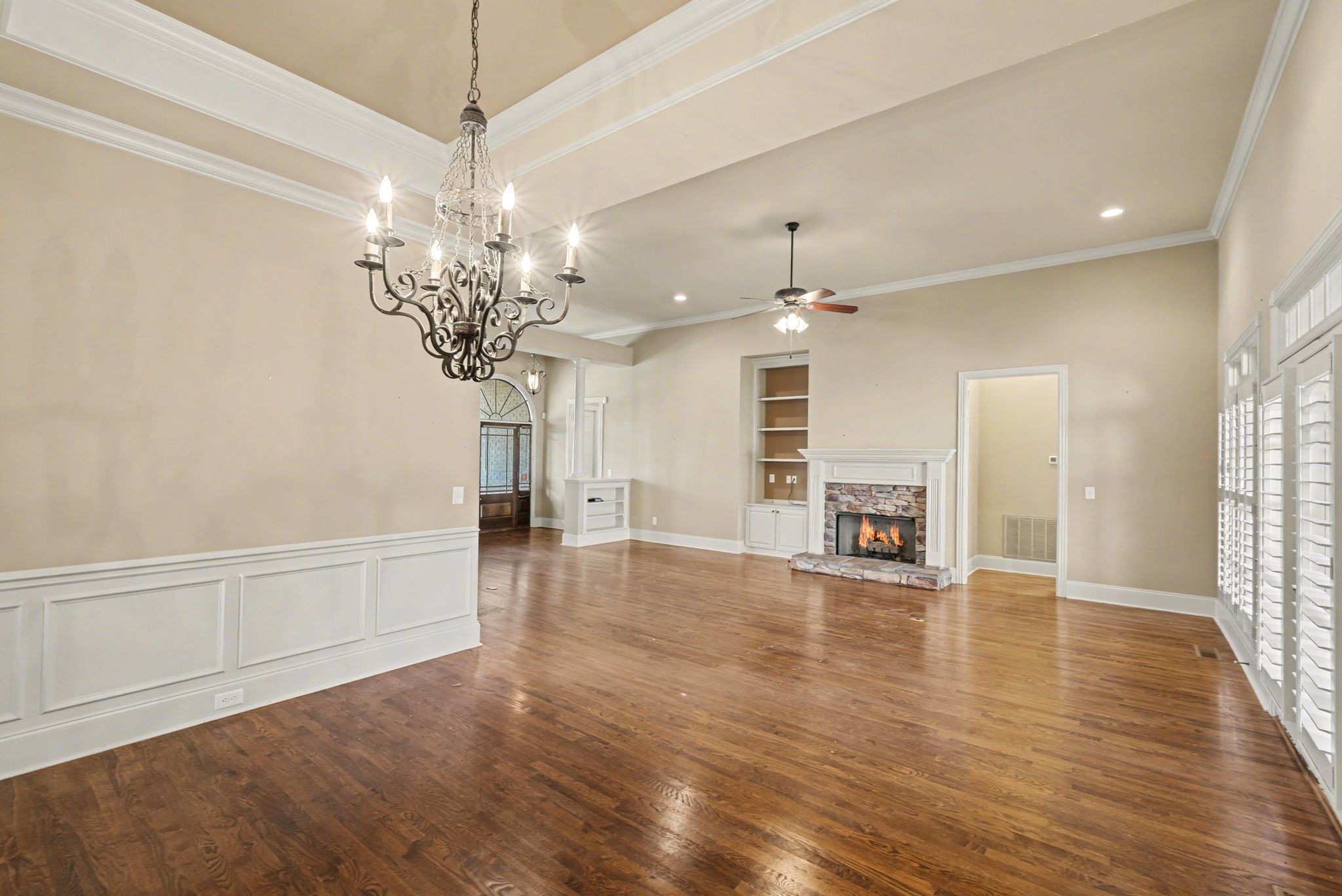 405 Luna Court Franklin, TN 37064 - Photo 18 of 57 a view of a livingroom with a chandelier fan and wooden floor