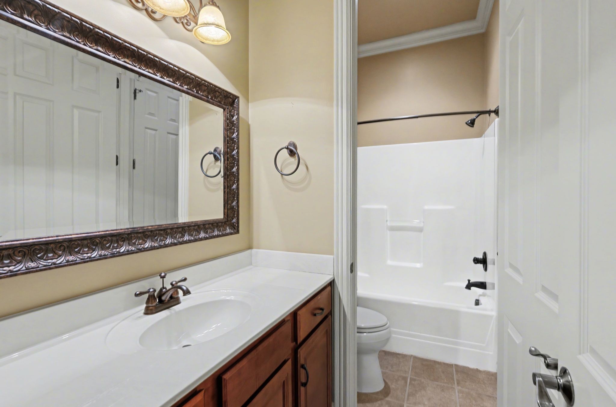 405 Luna Court Franklin, TN 37064 - Photo 34 of 57 a bathroom with a sink a toilet and shower