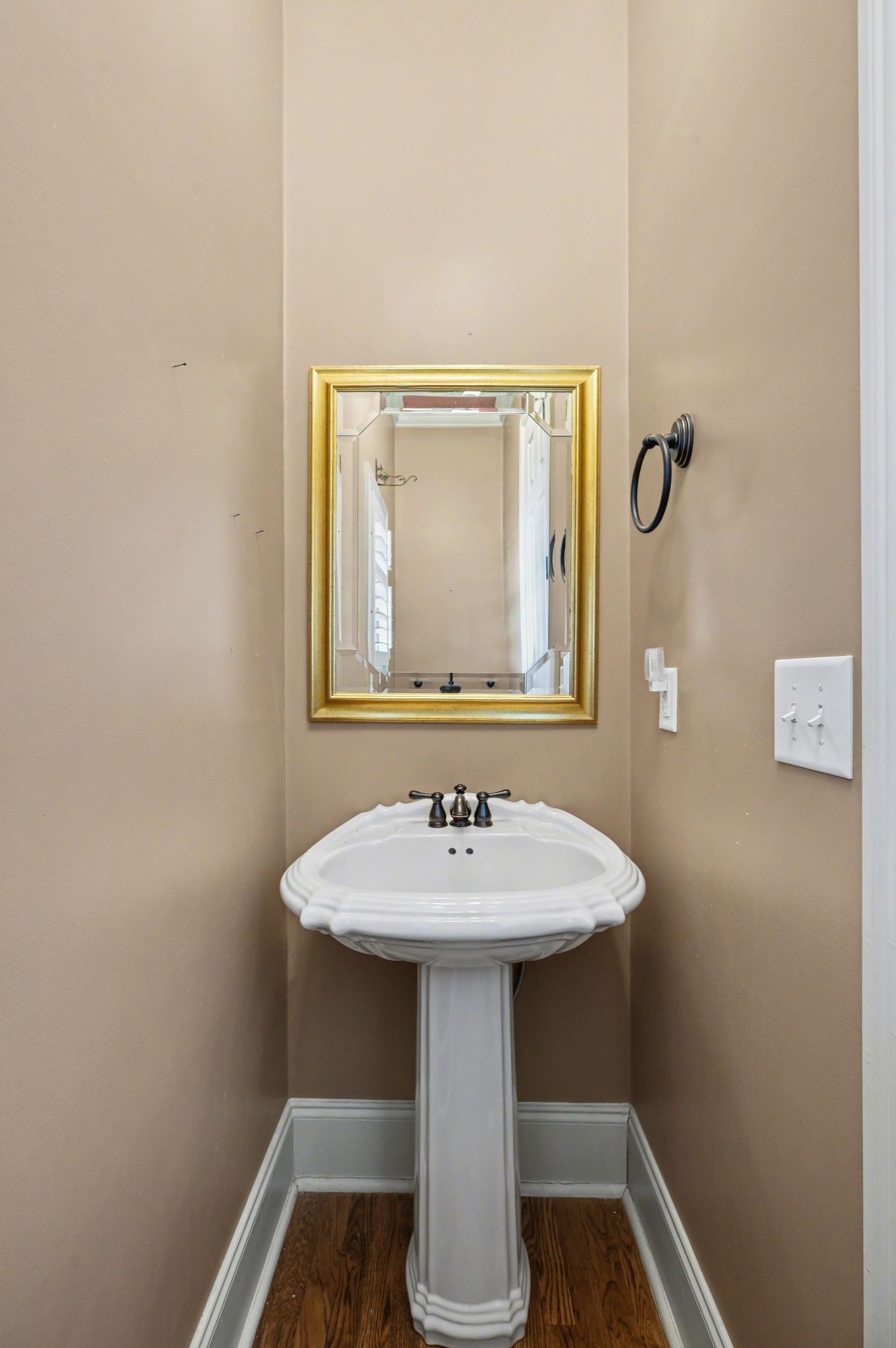 405 Luna Court Franklin, TN 37064 - Photo 39 of 57 a bathroom with a sink and a mirror