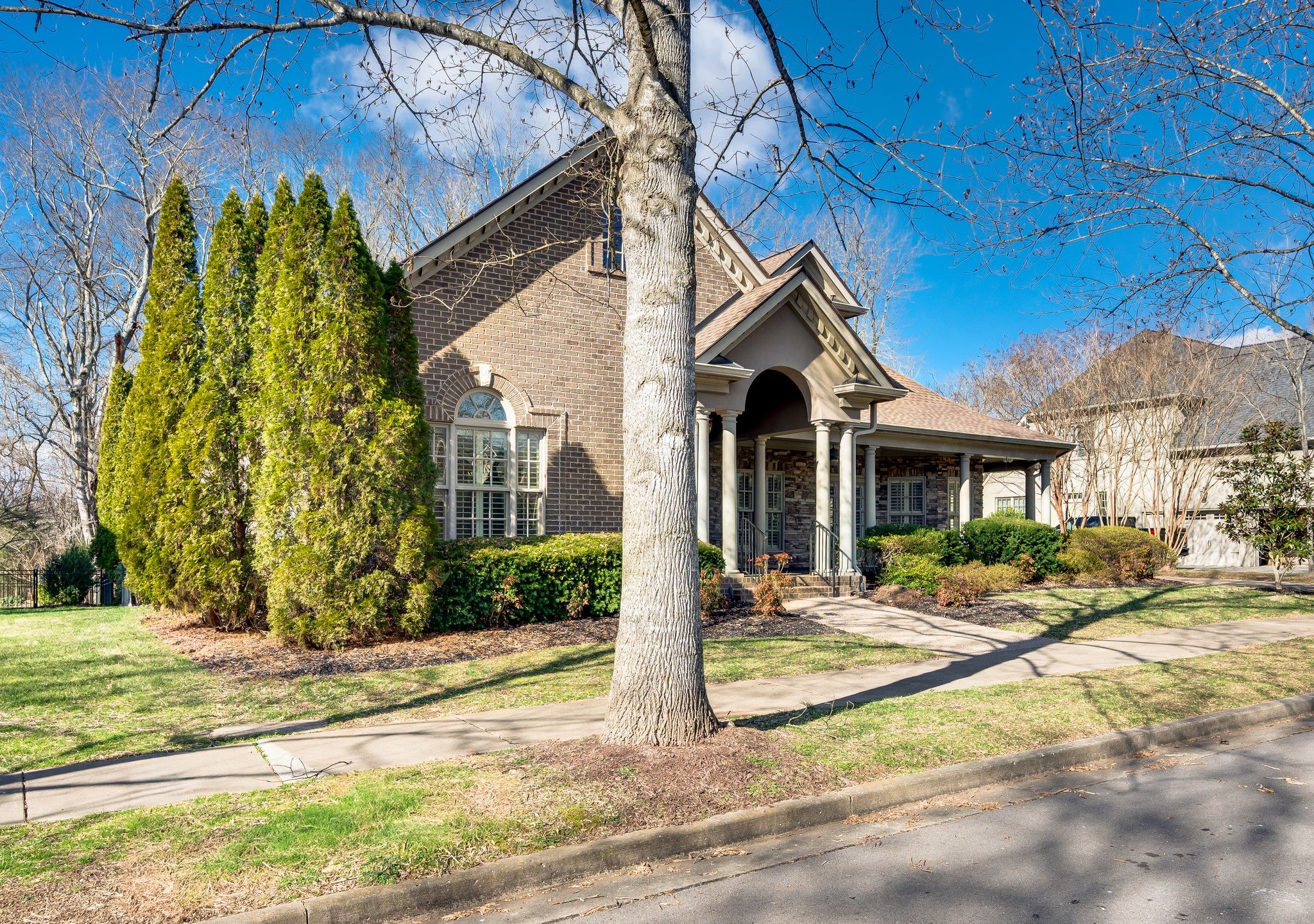 405 Luna Court Franklin, TN 37064 - Photo 4 of 57 a front view of a house with a yard