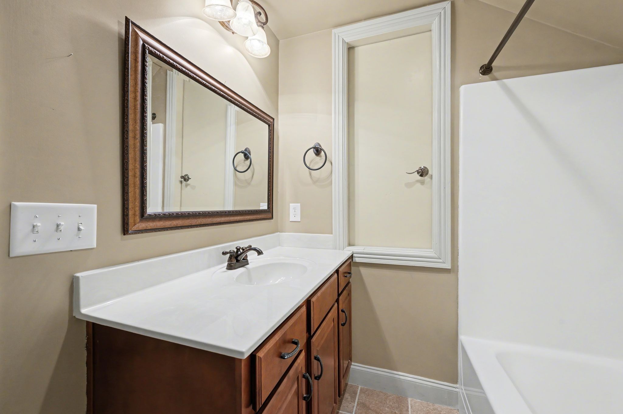 405 Luna Court Franklin, TN 37064 - Photo 45 of 57 a bathroom with a sink vanity and a mirror