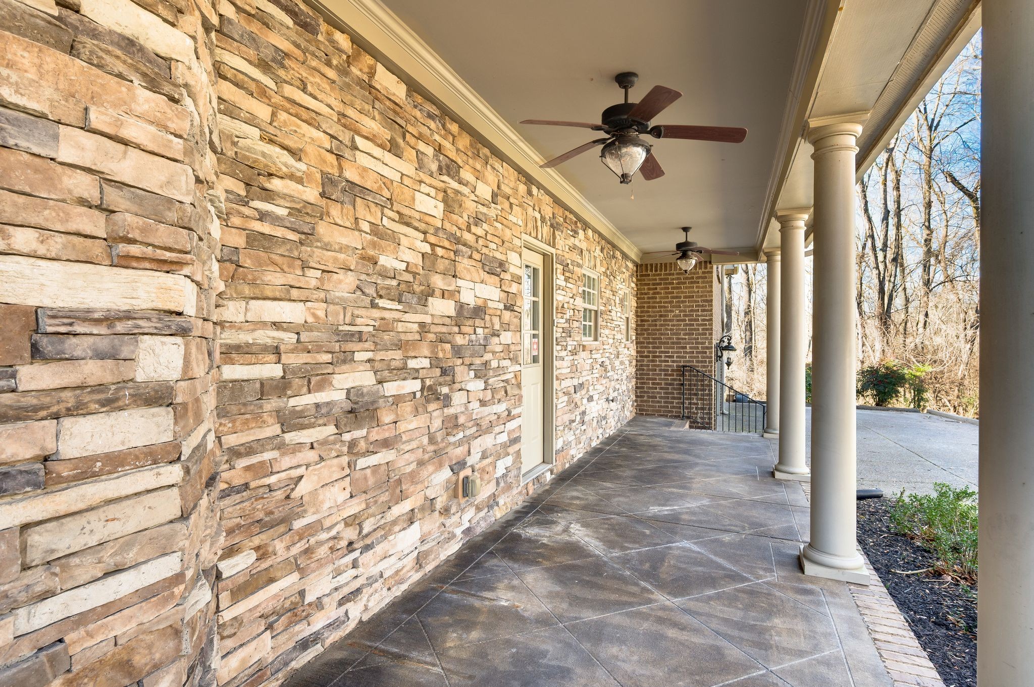 405 Luna Court Franklin, TN 37064 - Photo 55 of 57 a view of a hallway with a ceiling fan