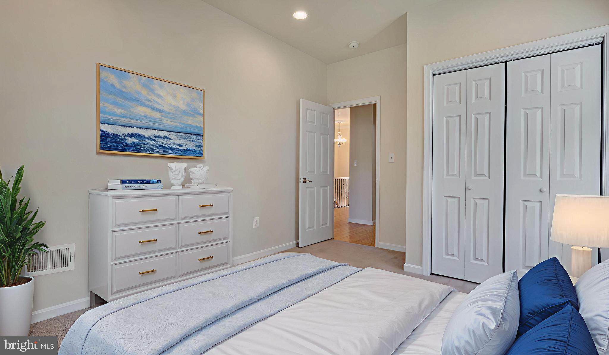 1337 Maple View Place Southeast Washington, DC 20020 - Photo 15 of 27 a bedroom with a bed and a painting on the wall