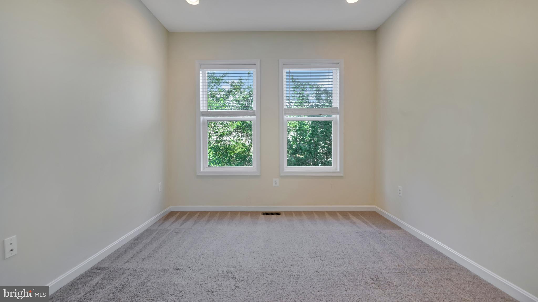 1337 Maple View Place Southeast Washington, DC 20020 - Photo 19 of 27 an empty room with a window