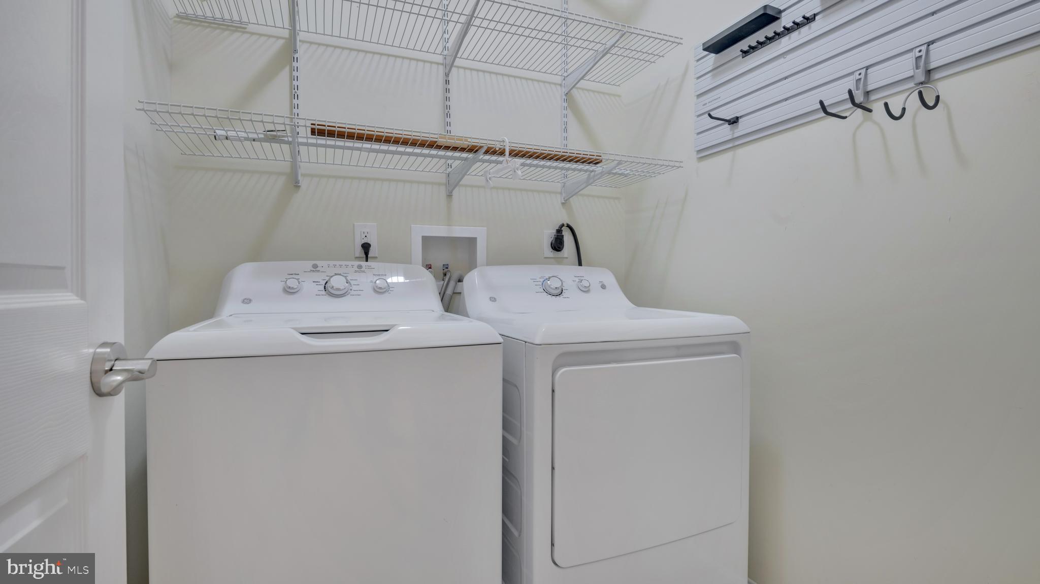 1337 Maple View Place Southeast Washington, DC 20020 - Photo 21 of 27 a utility room with dryer and washer
