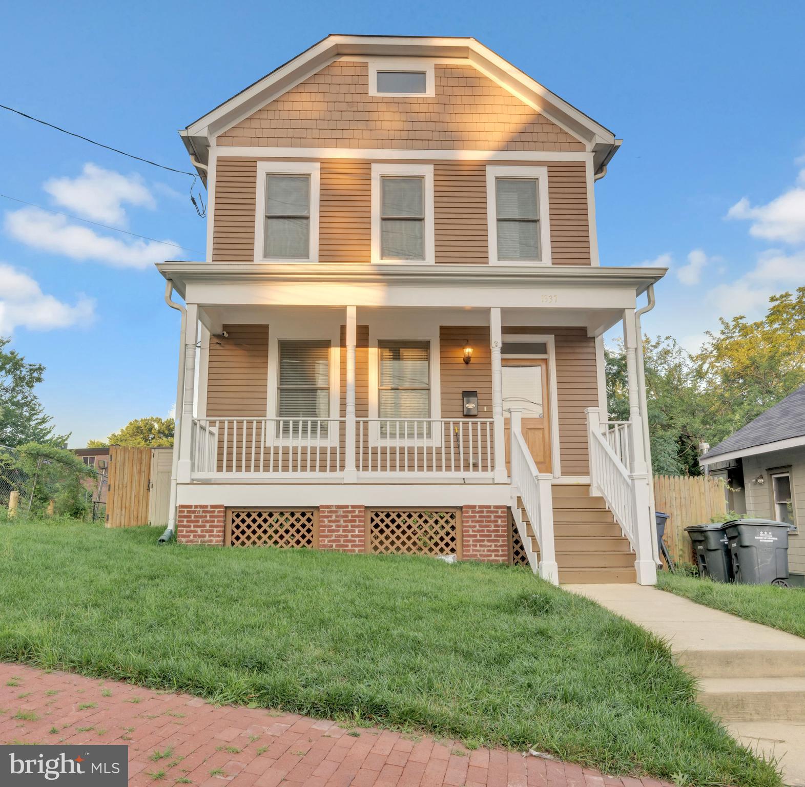 1337 Maple View Place Southeast Washington, DC 20020 - Photo 25 of 27 a front view of a house with a yard