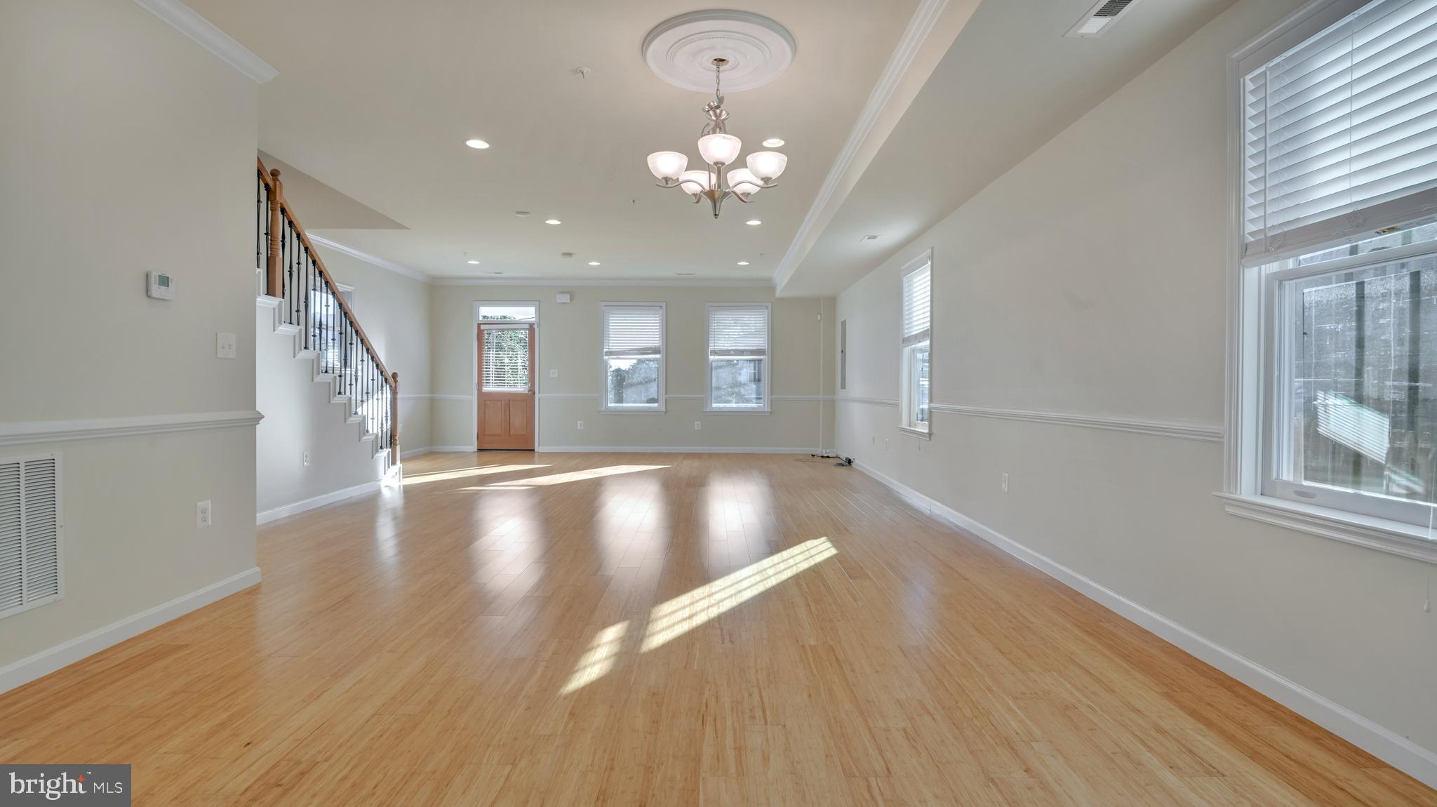 1337 Maple View Place Southeast Washington, DC 20020 - Photo 3 of 27 a view of livingroom and kitchen with hardwood floor