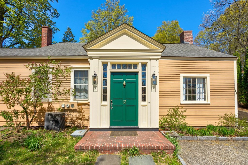 7 Lexington Road Concord, MA 01742 - Photo 5 of 42 a front view of a house with a yard