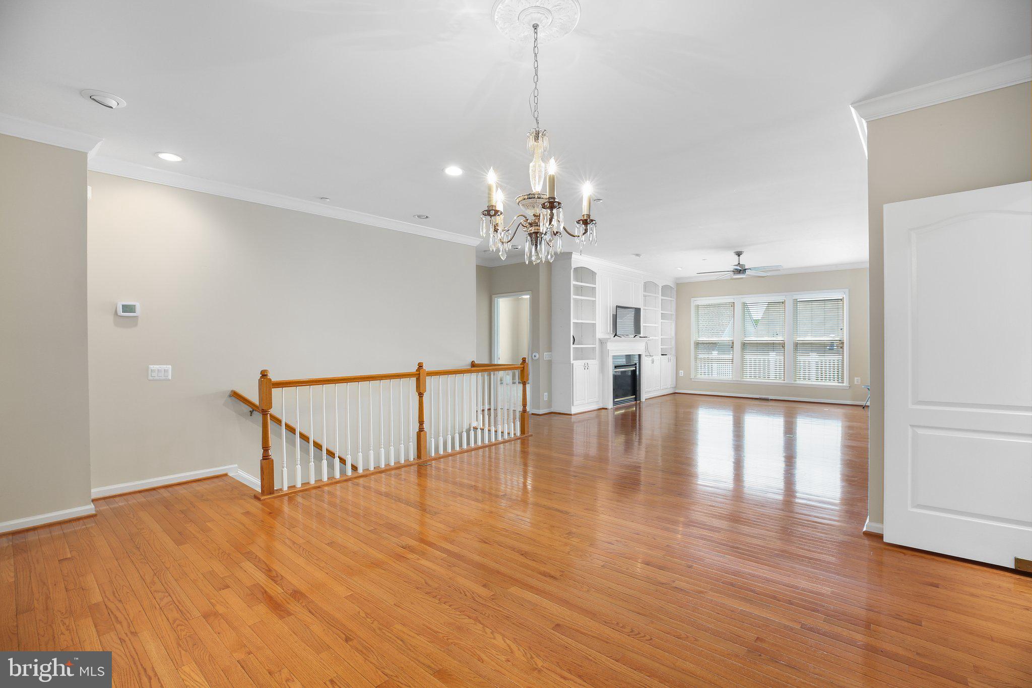 7 Carson Drive Fredericksburg, VA 22406 - Photo 11 of 51 a view of a room with wooden floor and large windows