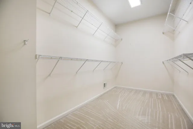 a view of a room with racks on the wall