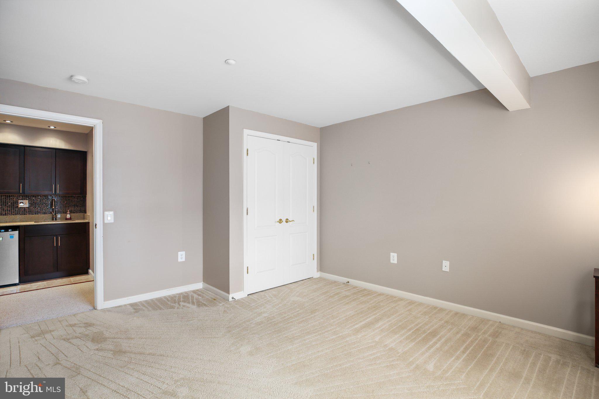 7 Carson Drive Fredericksburg, VA 22406 - Photo 36 of 51 a view of an empty room with kitchen and a window