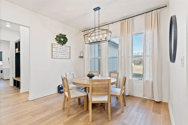 a kitchen with stainless steel appliances a sink stove and refrigerator