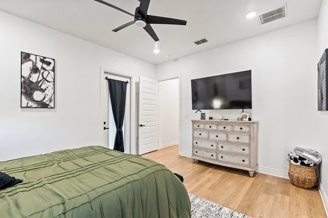a bathroom with a bathtub and a sink