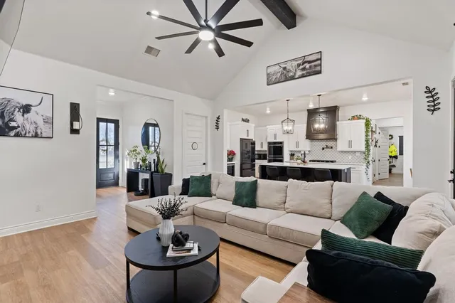 a view of front door with potted plant