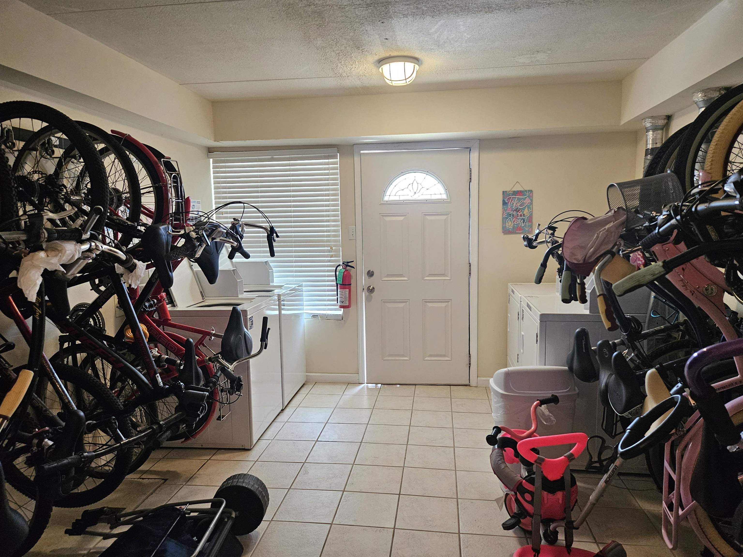 208 East Forget-Me-Not Road, Unit 111 Wildwood Crest, NJ 08260 - Photo 16 of 16 a view of a room with gym equipment