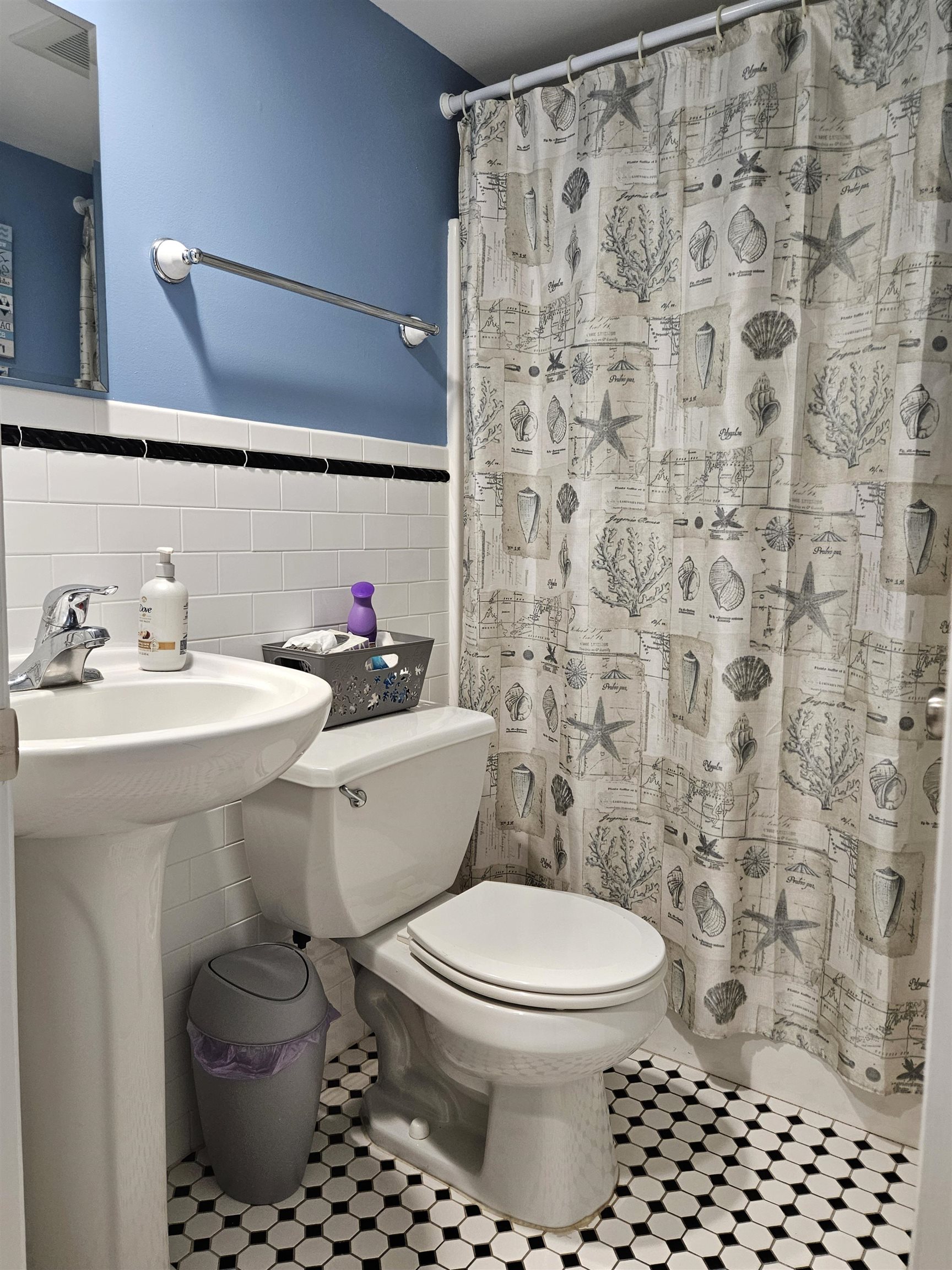208 East Forget-Me-Not Road, Unit 111 Wildwood Crest, NJ 08260 - Photo 8 of 16 a bathroom with a toilet a sink and a shower