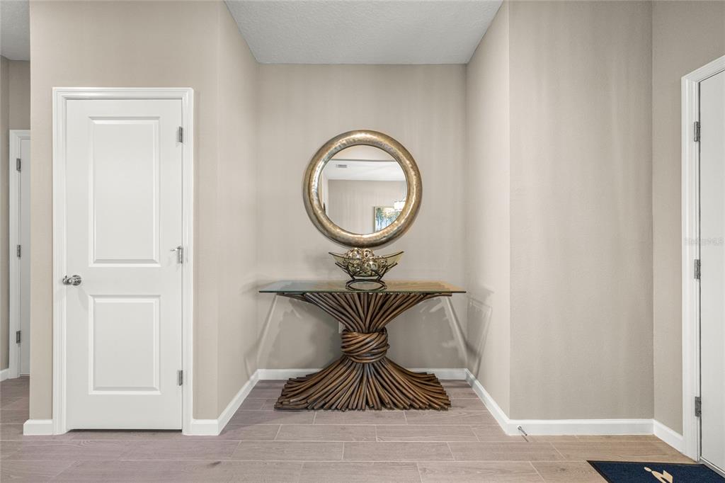 8904 Southwest 69th Terrace Ocala, FL 34476 - Photo 18 of 26 a view of a entryway with wooden floor