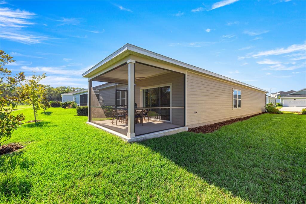 8904 Southwest 69th Terrace Ocala, FL 34476 - Photo 5 of 26 a view of a house with backyard