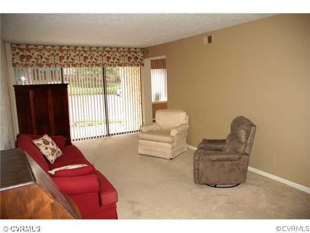 1505 Regency Woods Road, Unit 101 101 Henrico, VA 23238 - Photo 2 of 12 Living Room - Living Room with sliders to walk out patio