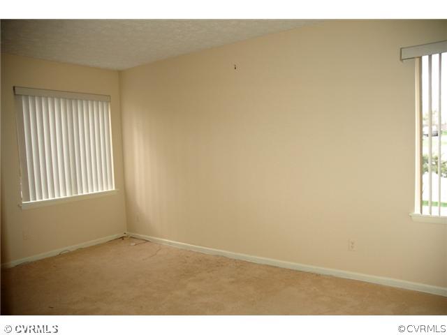 1505 Regency Woods Road, Unit 101 101 Henrico, VA 23238 - Photo 9 of 12 Master Bedroom - Master Bedroom with two windows