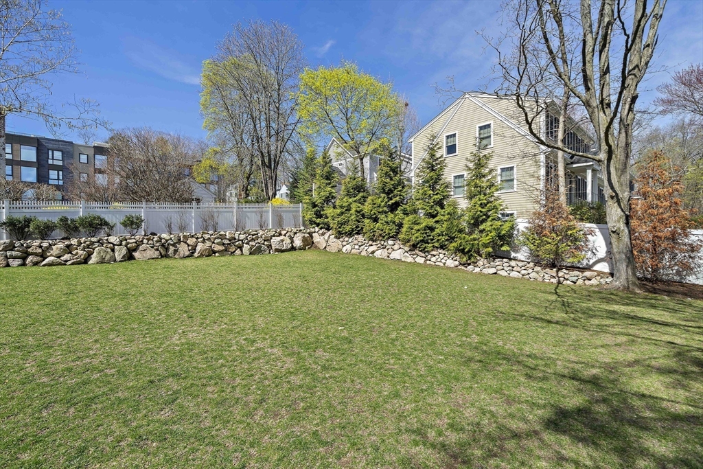 144 Linden Street, Unit 2 Wellesley, MA 02482 - Photo 27 of 28 a view of a garden
