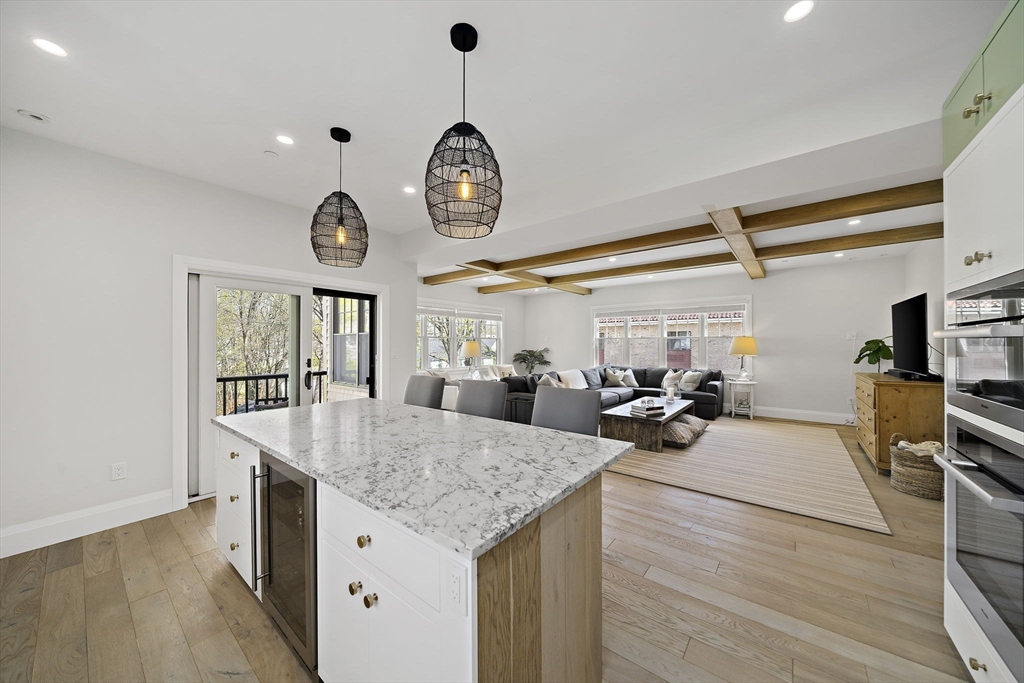 144 Linden Street, Unit 2 Wellesley, MA 02482 - Photo 4 of 28 a view of a kitchen counter space and a stove