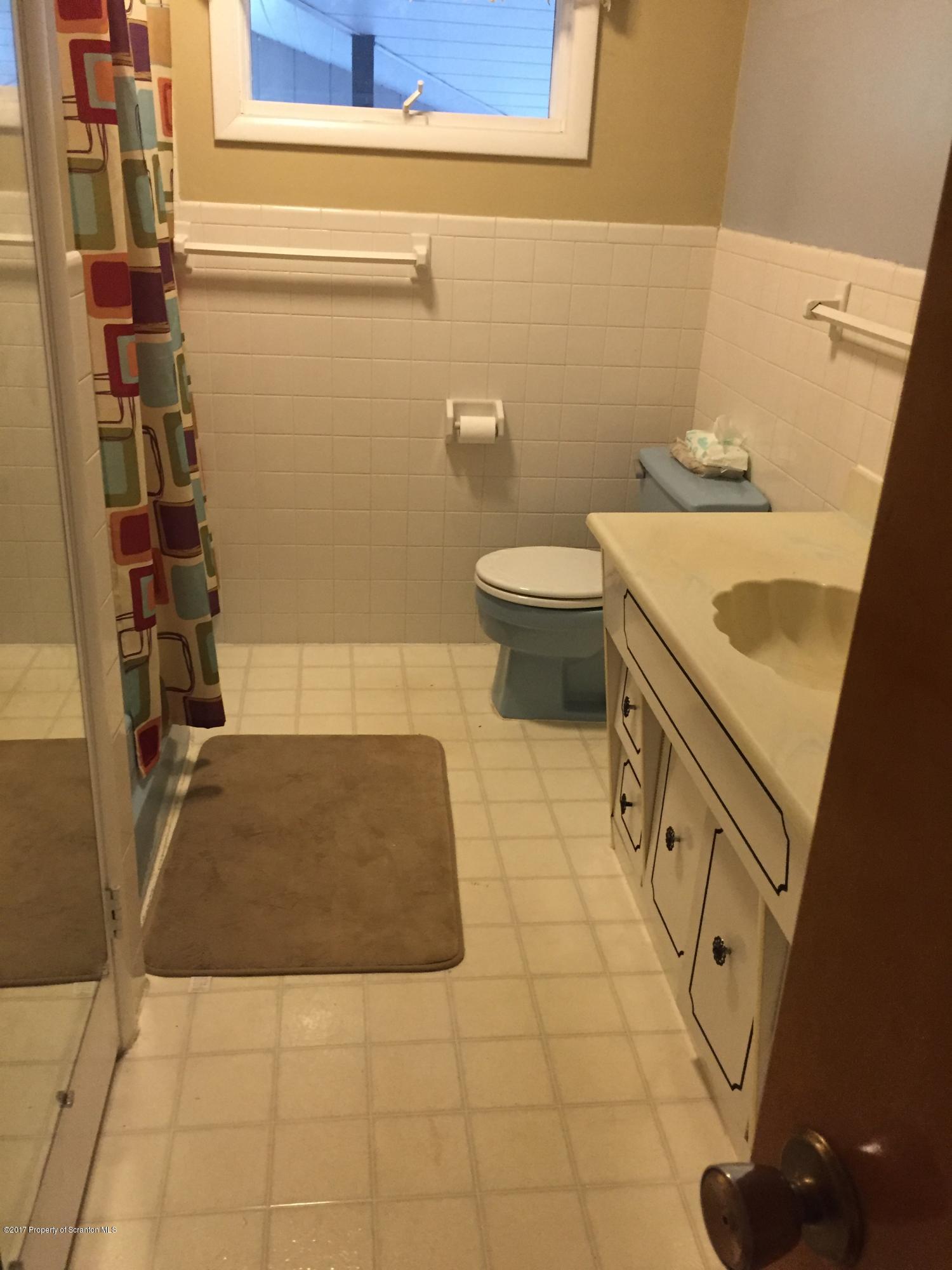 154 Hall Road Meshoppen, PA 18630 - Photo 15 of 35 a bathroom with a sink toilet and shower