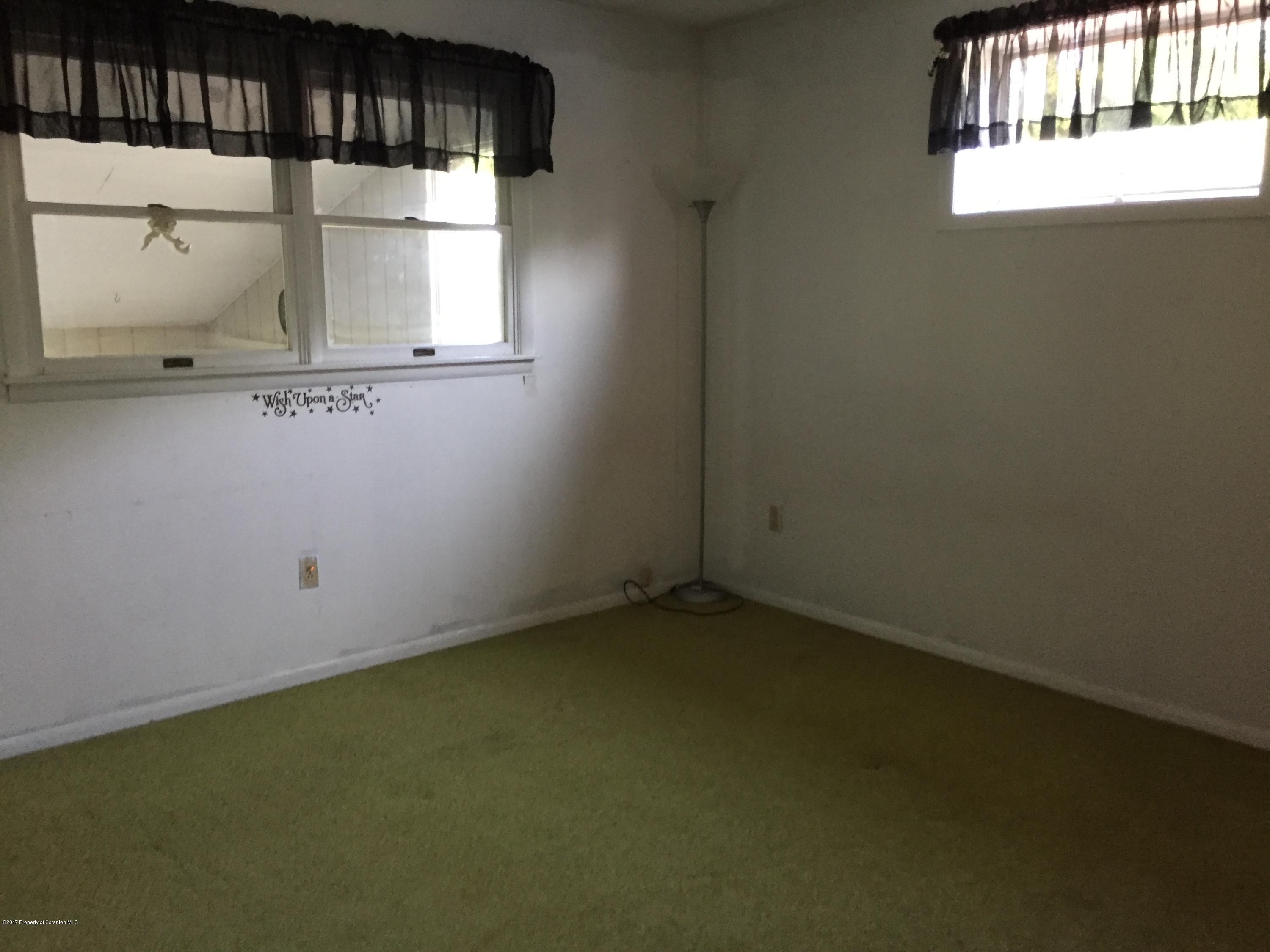 154 Hall Road Meshoppen, PA 18630 - Photo 17 of 35 an empty room with a window