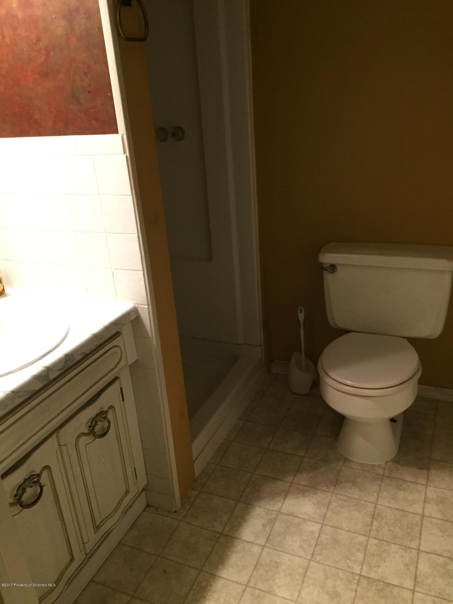 154 Hall Road Meshoppen, PA 18630 - Photo 27 of 35 a bathroom with a toilet and a shower