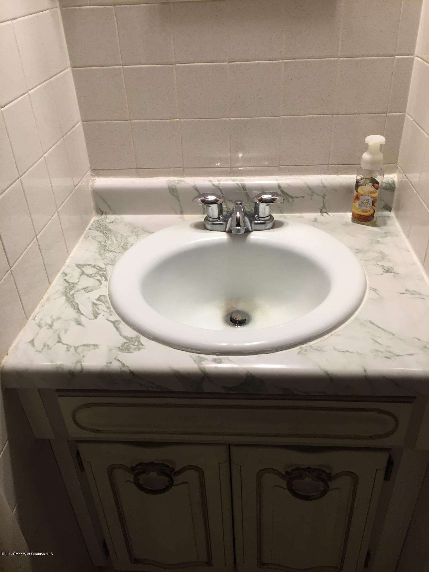 154 Hall Road Meshoppen, PA 18630 - Photo 28 of 35 a close view of a sink and tap