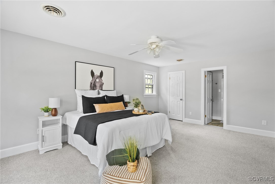 3600 Stoney Ridge Road Midlothian, VA 23112 - Photo 24 of 43 a bedroom with a bed and a chandelier