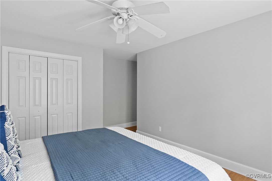 3600 Stoney Ridge Road Midlothian, VA 23112 - Photo 35 of 43 an empty room with wooden floor closet and windows