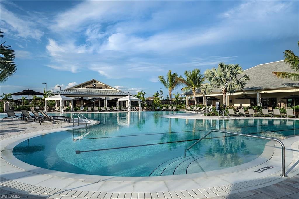 15324 Lucerna Street, Unit 201 Naples, FL 34114 - Photo 12 of 34 View of pool featuring a patio area