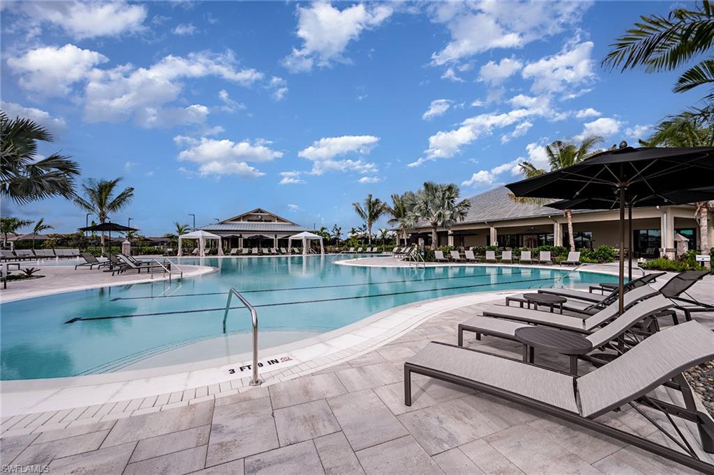 15324 Lucerna Street, Unit 201 Naples, FL 34114 - Photo 13 of 34 View of swimming pool featuring a patio