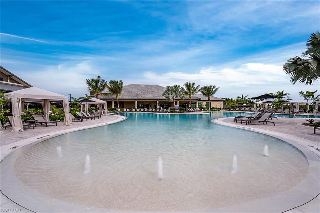 15324 Lucerna Street, Unit 201 Naples, FL 34114 - Photo 14 of 34 View of pool featuring a gazebo, a patio area, and pool water feature