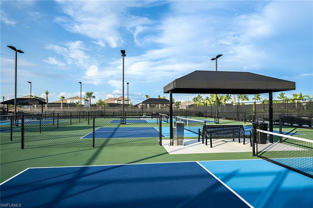 15324 Lucerna Street, Unit 201 Naples, FL 34114 - Photo 22 of 34 View of tennis court
