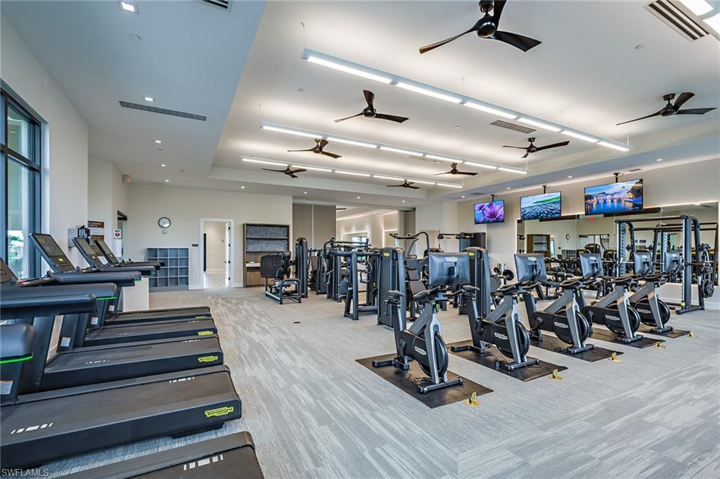 15324 Lucerna Street, Unit 201 Naples, FL 34114 - Photo 26 of 34 Exercise room featuring light carpet