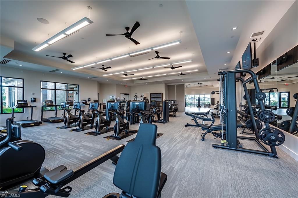 15324 Lucerna Street, Unit 201 Naples, FL 34114 - Photo 28 of 34 Gym with ceiling fan and light carpet