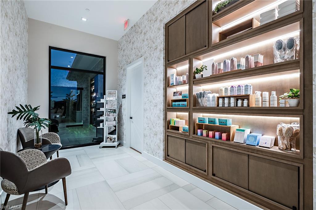 15324 Lucerna Street, Unit 201 Naples, FL 34114 - Photo 31 of 34 Hall featuring light tile patterned flooring