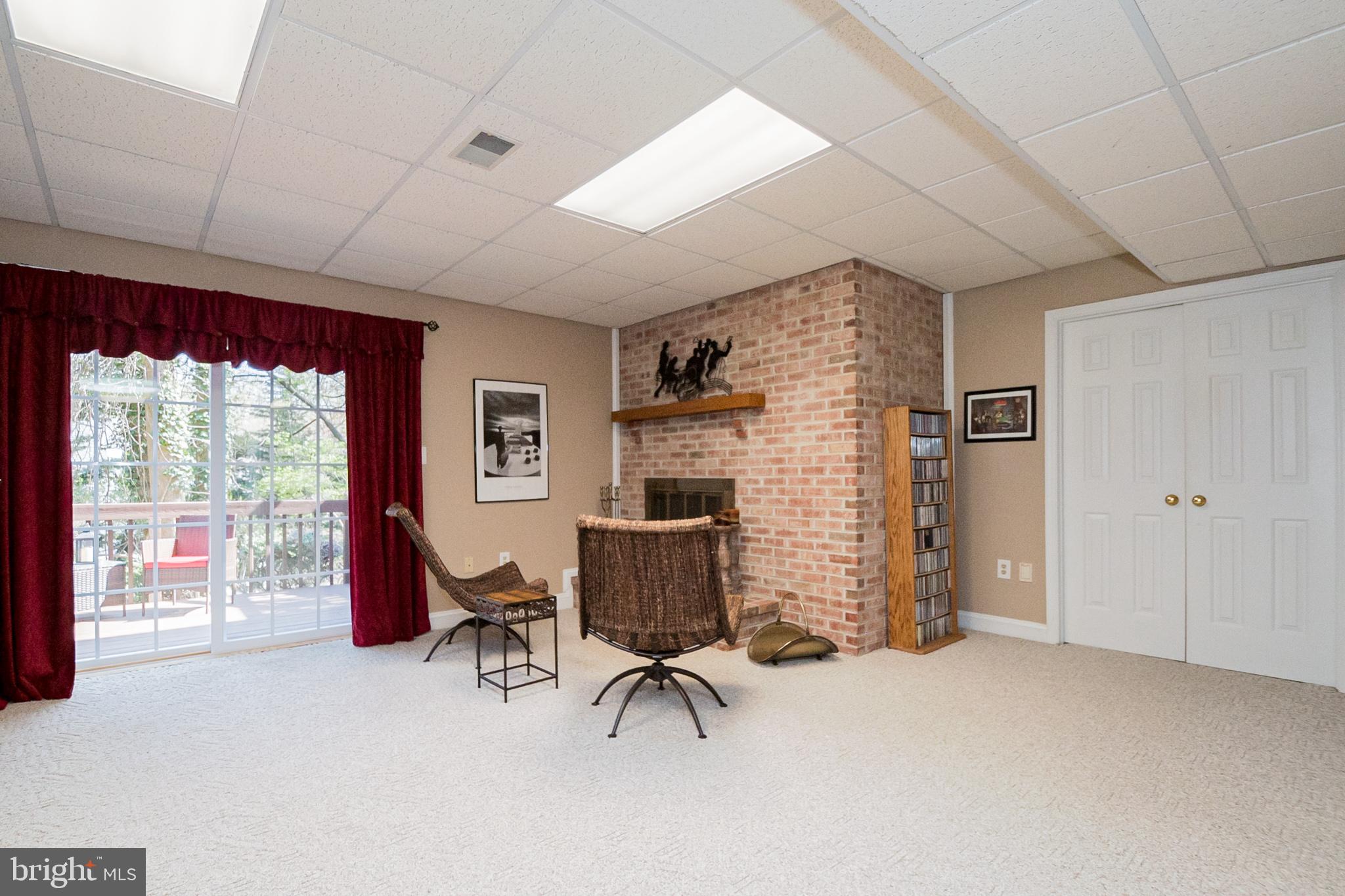 31 Forest Ridge Road Newark, DE 19711 - Photo 43 of 52 Cozy Wood Burning Fireplace with Brick Surround