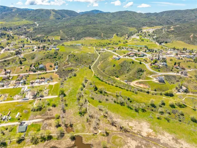 a view of an aerial view of residential houses with outdoor space