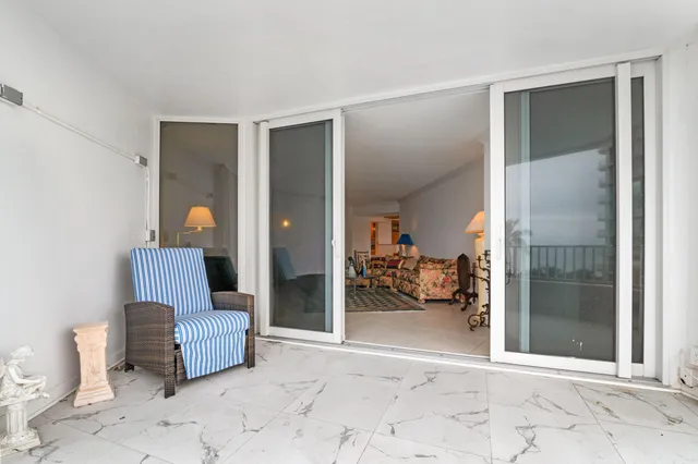 a view of livingroom with furniture and windows