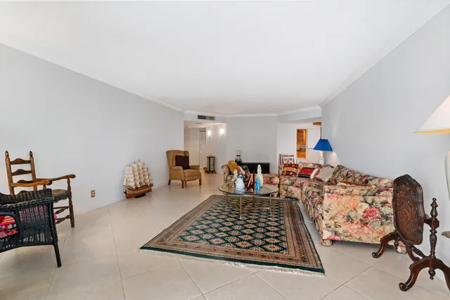 a bed room with furniture and a window