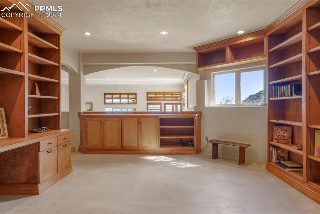 915 Oak Ridge Road Manitou Springs, CO 80829 - Photo 26 of 50 a view of furniture and cabinet in a room