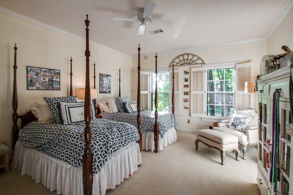 4338 Estes Road Nashville, TN 37215 - Photo 11 of 17 a bedroom with furniture and a chandelier