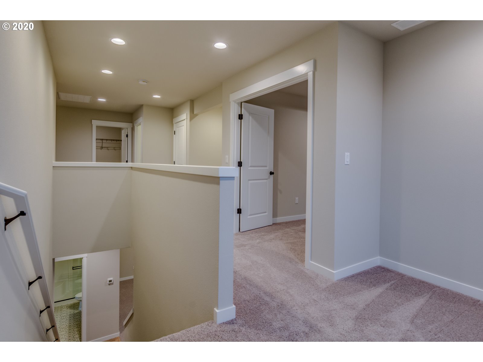 8524 North 1st Street, Unit LT96 Ridgefield, WA 98642 - Photo 29 of 32 a view of an empty room and wooden floor